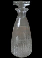 cut glass carafe with 6-sided stopper.